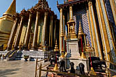 Bangkok Grand Palace, the Wat Phra Keow (temple of the Emerald Buddha), general view of the raised platform with in the foreground one of the four monuments dedicated to Chakri kings. 